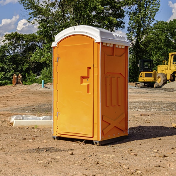 how often are the portable restrooms cleaned and serviced during a rental period in East Lynn